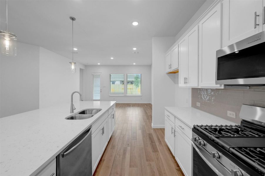 Furnished interior view inside a new home in Meridiana - Terrace Collection, Manvel (Image 8).