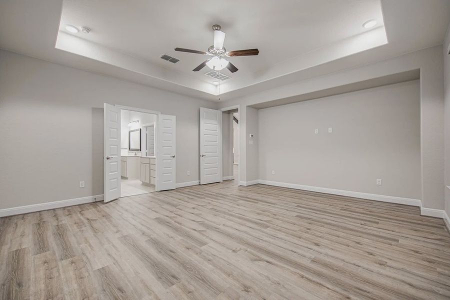 Representative unfurnished interior of a home built from the Calvin by Chesmar Homes in Heimer Estates at Garden Ridge, Fulshear (Image 18).