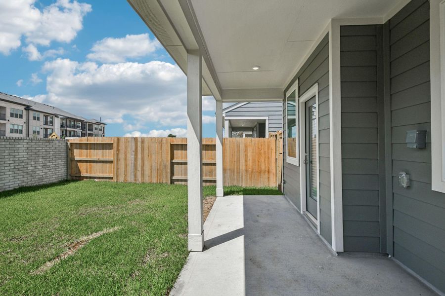 Exterior details and patio area of a home in Parkway Commons - City Series, Missouri City (Image 4). Exterior details and patio area of a home in Parkway Commons - City Series, Missouri City (Image 4).