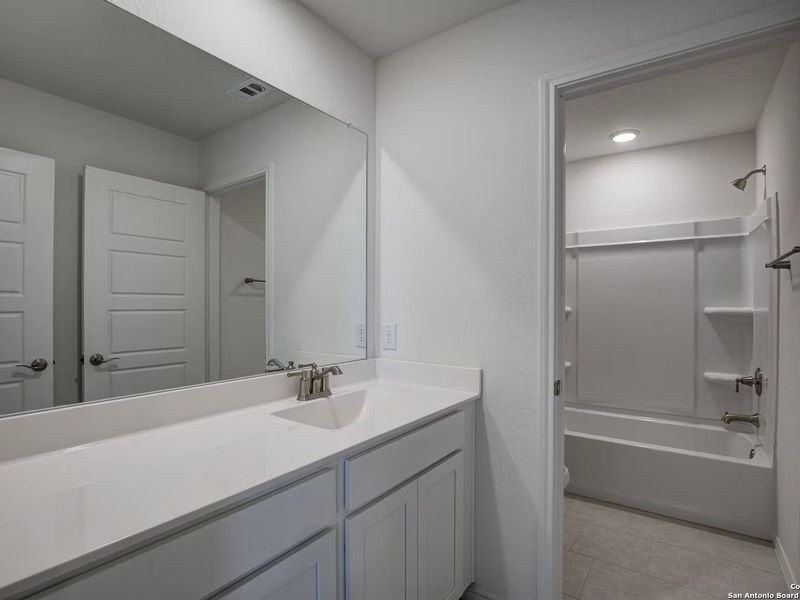 Furnished interior view inside a new home in Hannah Heights, Seguin (Image 9).