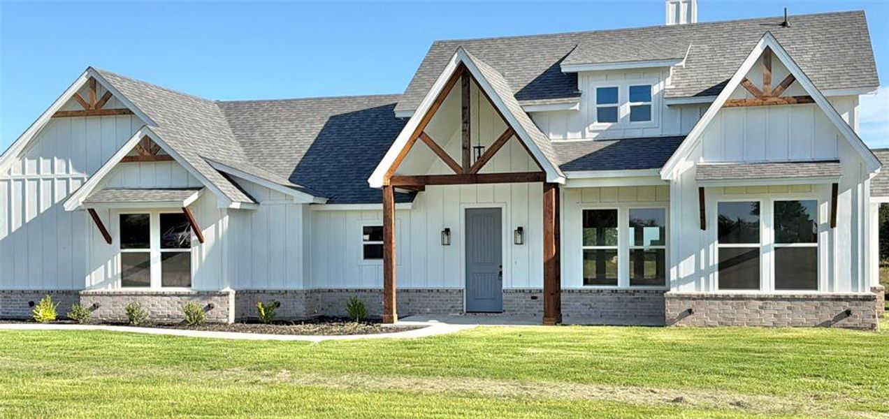 Front exterior of a new home in , Weatherford, TX, highlighting curb appeal (Image 14).