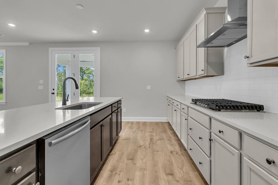 Furnished interior view inside a new home in Tidewater at Lakes of Cane Bay, Summerville (Image 13).