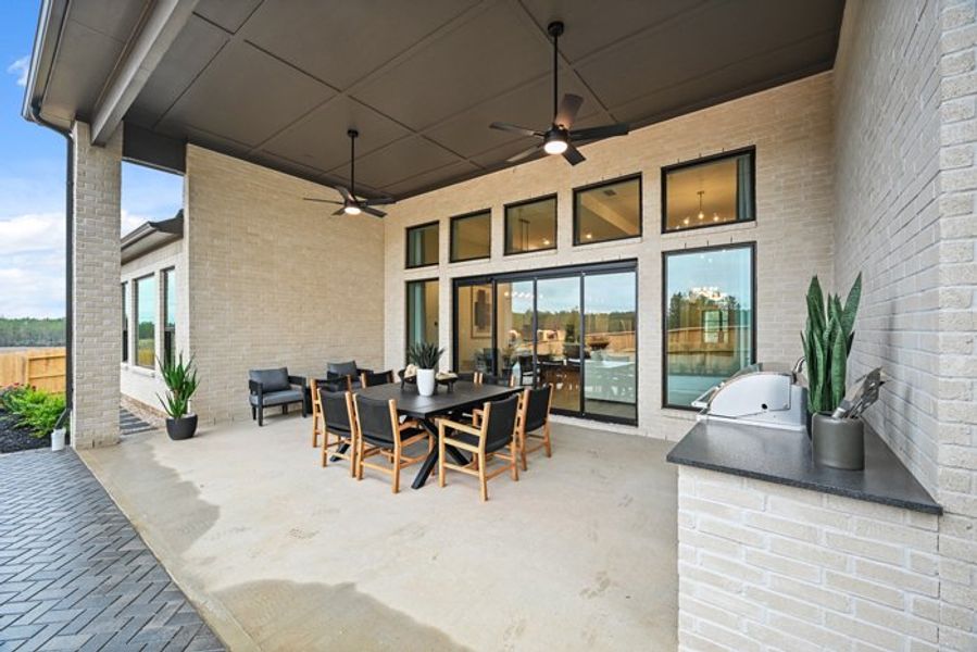 Exterior details and patio area of a home in Wildtree 70', Montgomery (Image 21).
