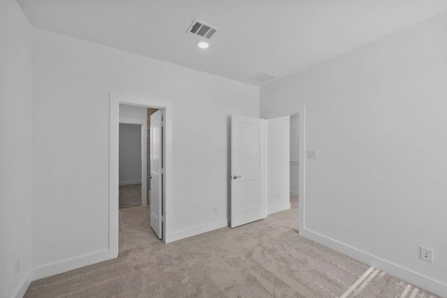 Representative unfurnished interior of a home built from the Cheverny by Chesmar Homes in Bridgeland Chateau, Cypress (Image 31).