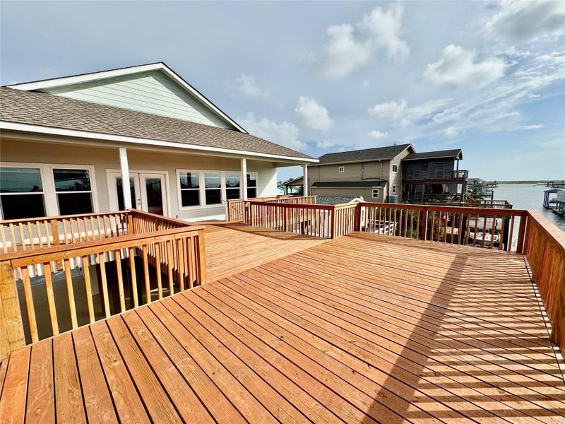 Exterior details and patio area of a home in , Bayou Vista (Image 26).