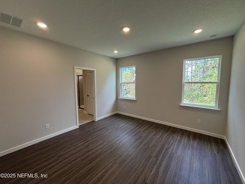 Spacious, unfurnished interior of a new home in The Magnolia Series at Reserve East, Flagler Beach (Image 26).