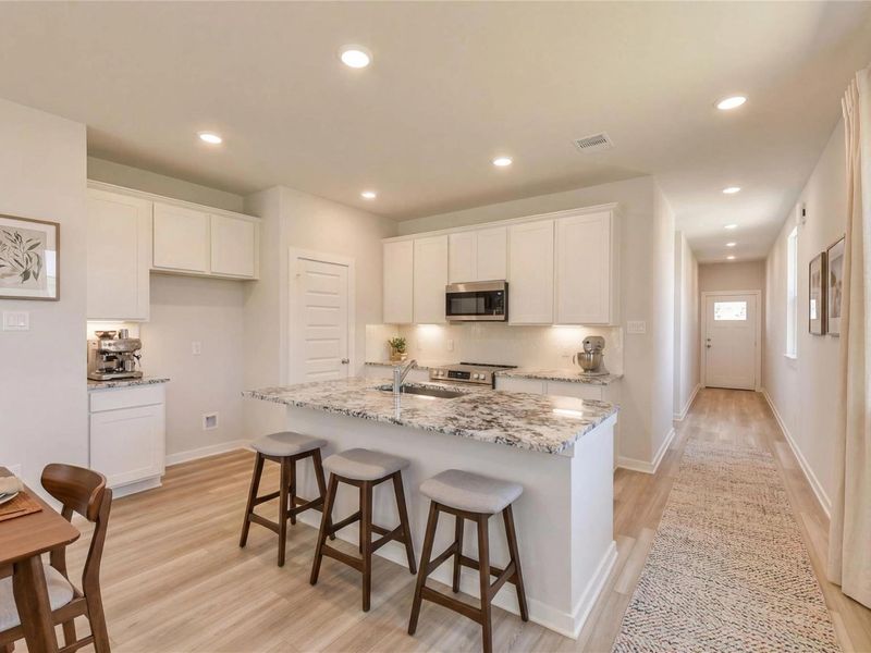 Furnished interior view inside a new home in Spring Branch Crossing, Conroe (Image 6).