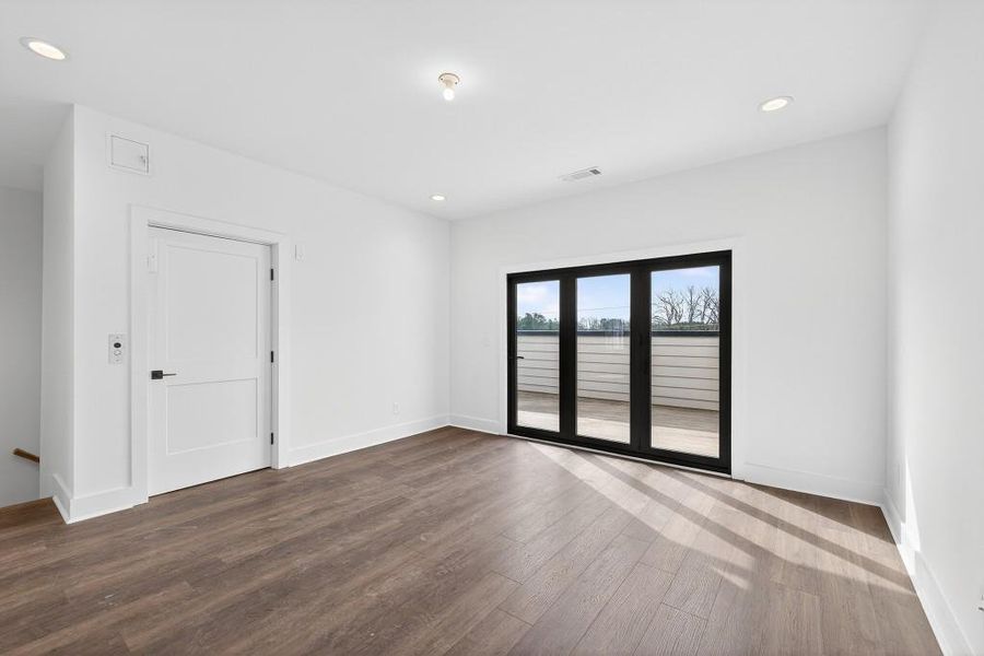 Spacious, unfurnished interior of a new home in Skyview On Broad, Sugar Hill (Image 32). Spacious, unfurnished interior of a new home in Skyview On Broad, Sugar Hill (Image 32).