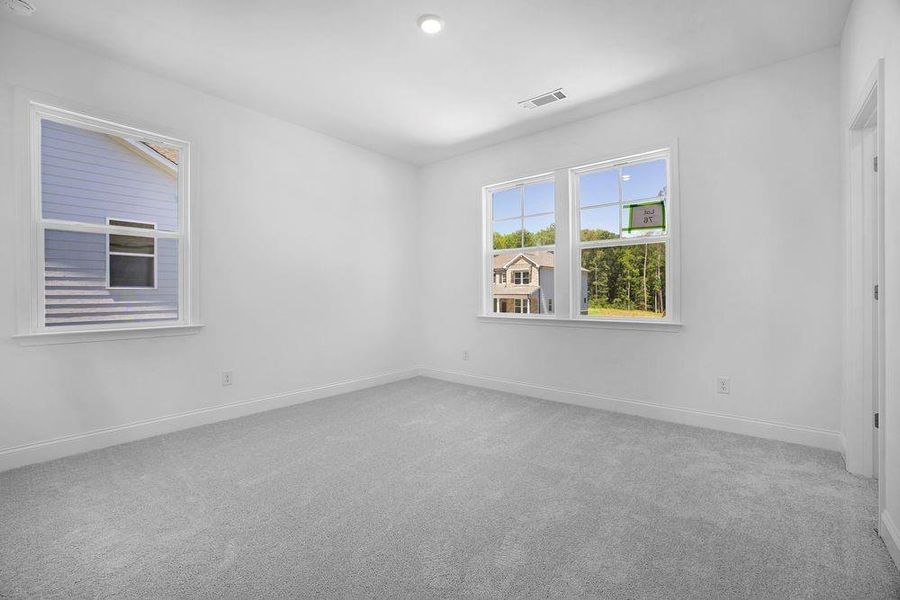 Spacious, unfurnished interior of a new home in Bailey Fence, Dacula (Image 18).