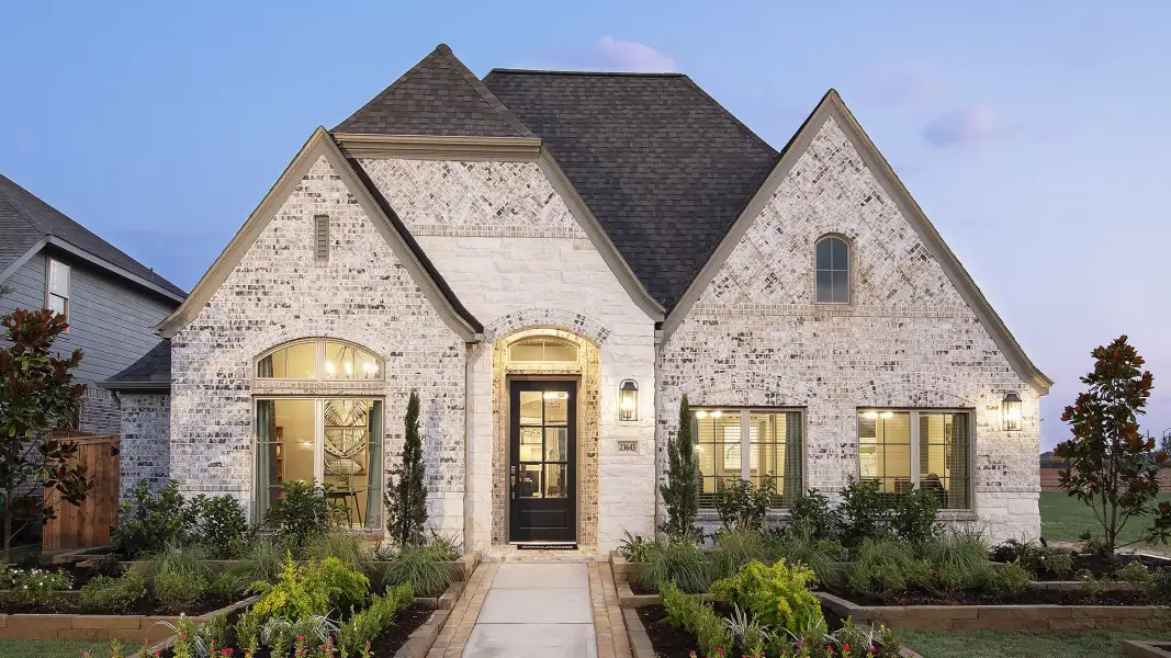 Front exterior of a new home in North Sky, Celina, TX, highlighting curb appeal (Image 2). Front exterior of a new home in North Sky, Celina, TX, highlighting curb appeal (Image 2).