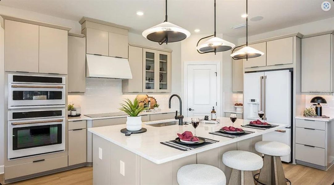 Furnished interior view inside a new home in Esplanade at Wellen Park, Englewood (Image 3).
