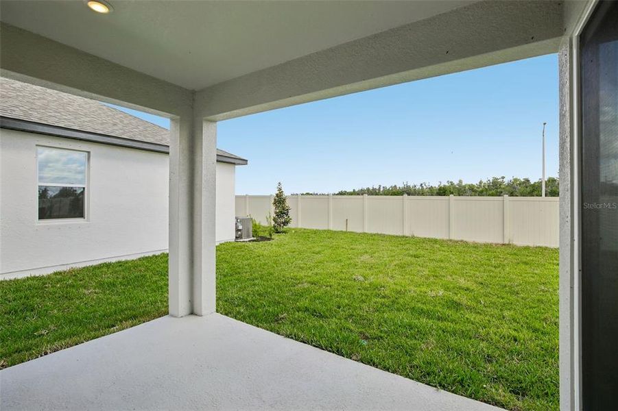 Exterior details and patio area of a home in Berry Bay, Wimauma (Image 3).