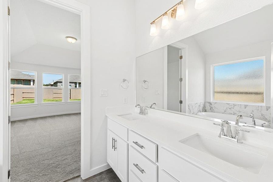Furnished interior view inside a new home in The Colony, Bastrop (Image 6). Furnished interior view inside a new home in The Colony, Bastrop (Image 6).