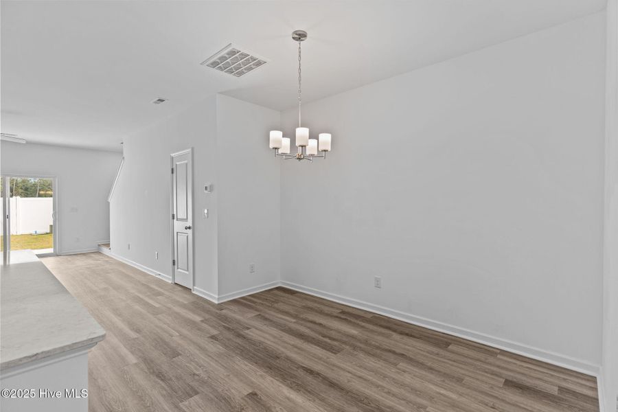 Spacious, unfurnished interior of a new home in Coastal Haven Townes, Leland (Image 17).