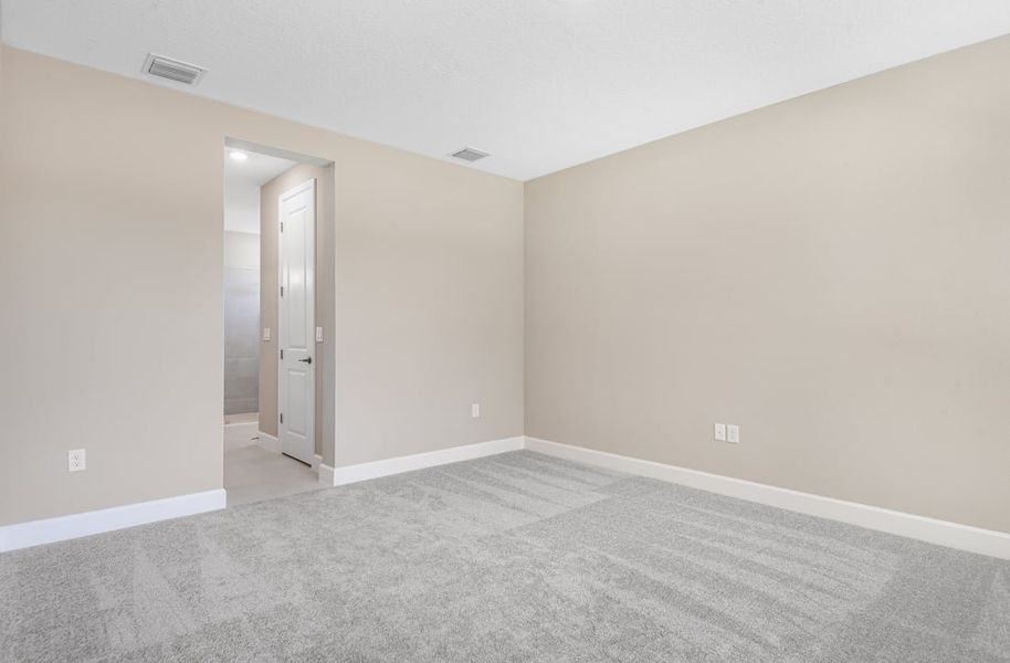 Representative unfurnished interior of a home built from the Antilla by Taylor Morrison in Colbert Landings, Palm Coast (Image 15).