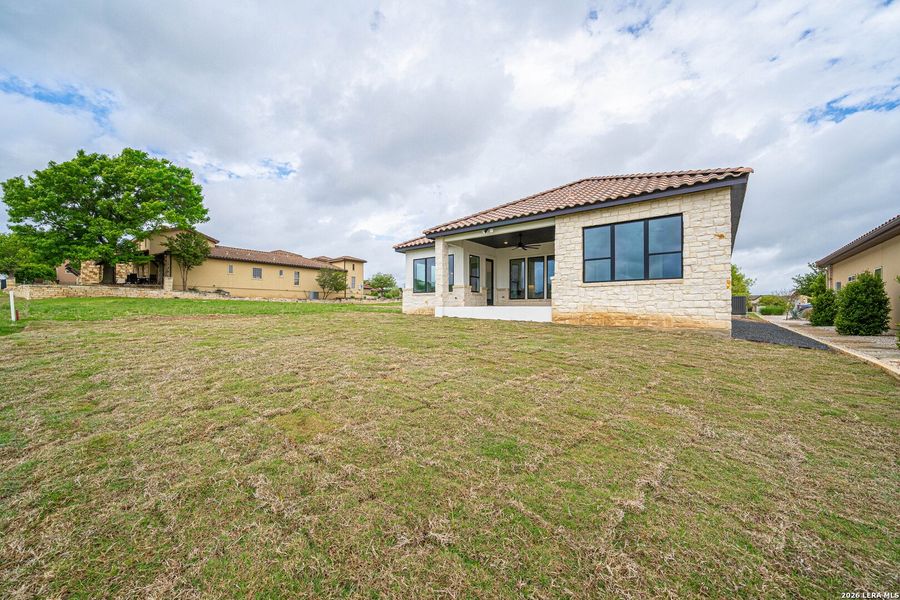 Exterior details and patio area of a home in , Kerrville (Image 22).