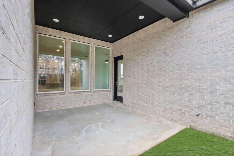 Exterior details and patio area of a home in Grand Central Park, Conroe (Image 4). Exterior details and patio area of a home in Grand Central Park, Conroe (Image 4).