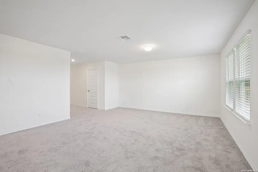 Spacious, unfurnished interior of a new home in Medina Crossing, Von Ormy (Image 27).