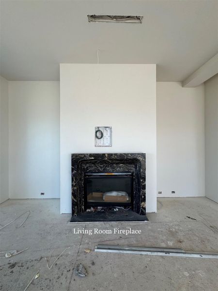 Expansive Living Room featuring a Marble Fireplace. Balcony located on the left hand side.