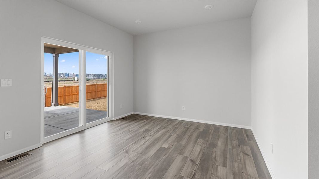 Spacious, unfurnished interior of a new home in The Legacy Collection at Talon Pointe, Thornton (Image 8).