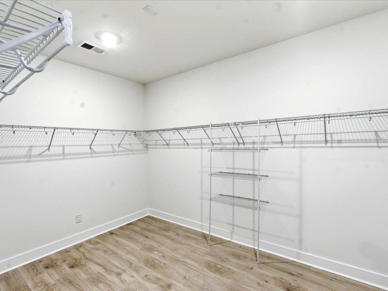 Spacious, unfurnished interior of a new home in The Coves at Lakes of Cane Bay II, Summerville (Image 36).