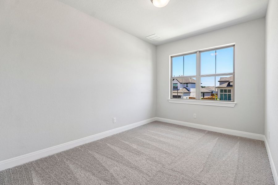 Representative unfurnished interior of a home built from the Hamilton by Risewell Homes in 6 Creeks, Kyle (Image 16).