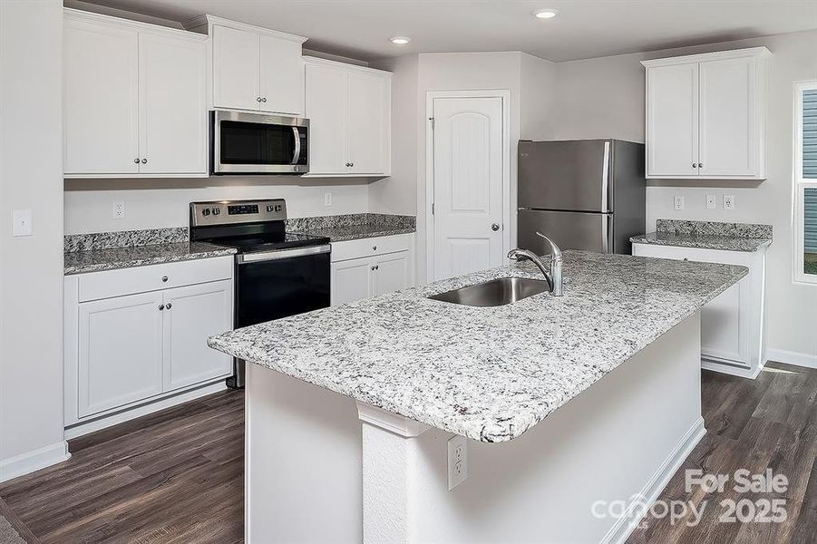 Furnished interior view inside a new home in McKee Creek Village, Charlotte (Image 7).