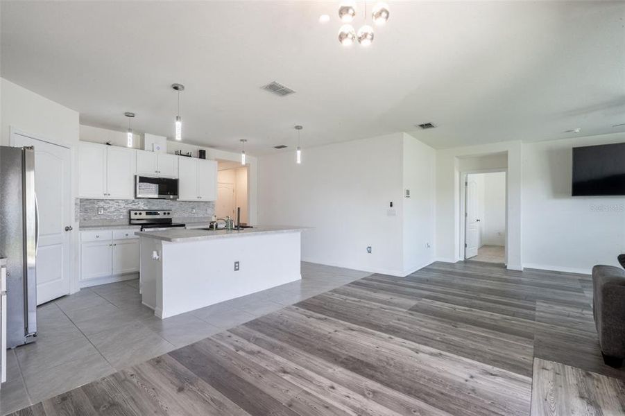 Furnished interior view inside a new home in Poinciana Enclave, Kissimmee (Image 12).