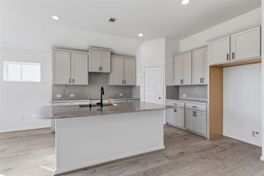 Furnished interior view inside a new home in Creekhaven, Iowa Colony (Image 8).