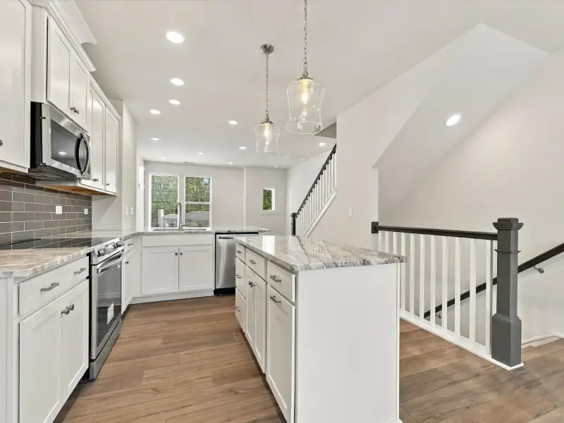 Furnished interior view inside a new home in Central Living at Craig, Charlotte (Image 6).