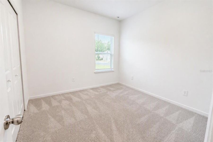 Spacious, unfurnished interior of a new home in Grand Park North, Dunnellon (Image 22).