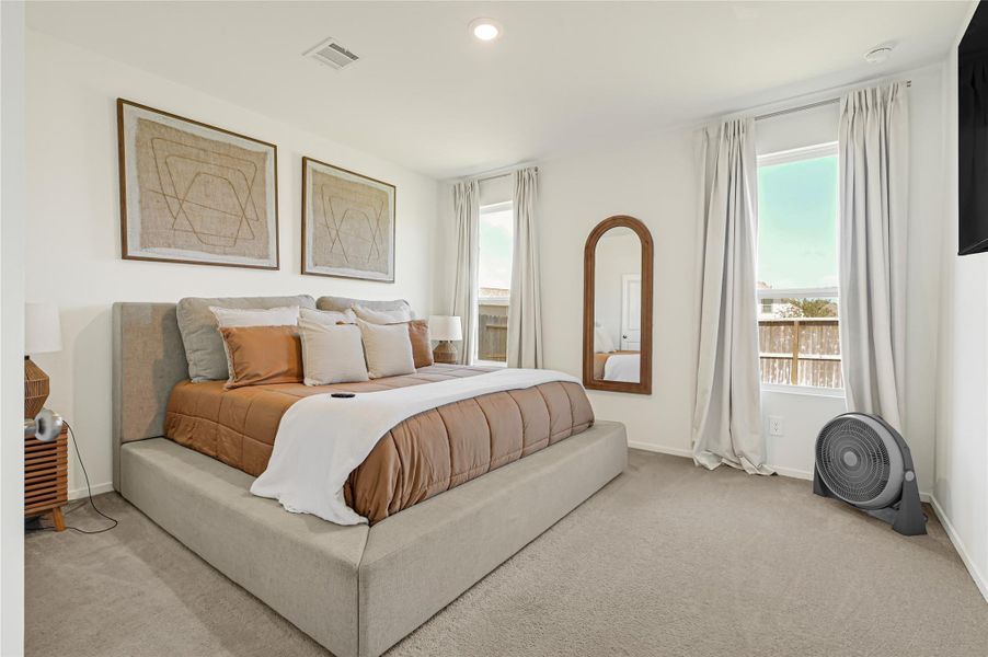 Bright and inviting bedroom featuring large windows with elegant curtains, a plush bed with soft, neutral tones, and modern decor for a serene atmosphere. Bright and inviting bedroom featuring large windows with elegant curtains, a plush bed with soft, neutral tones, and modern decor for a serene atmosphere.