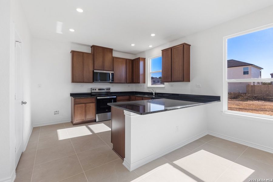 Furnished interior view inside a new home in Southton Cove, Elmendorf (Image 9).