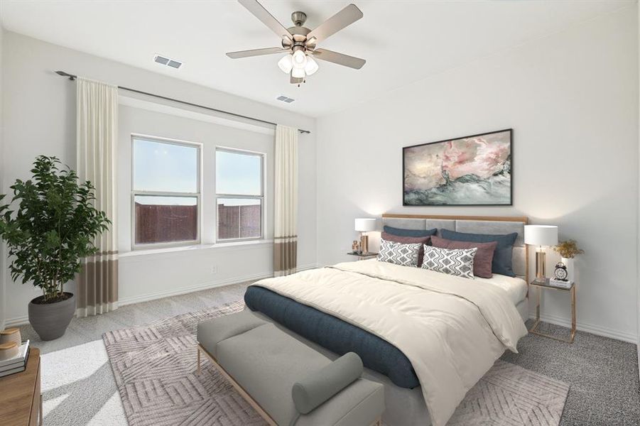 Bedroom with baseboards, carpet flooring, and a ceiling fan Bedroom with baseboards, carpet flooring, and a ceiling fan