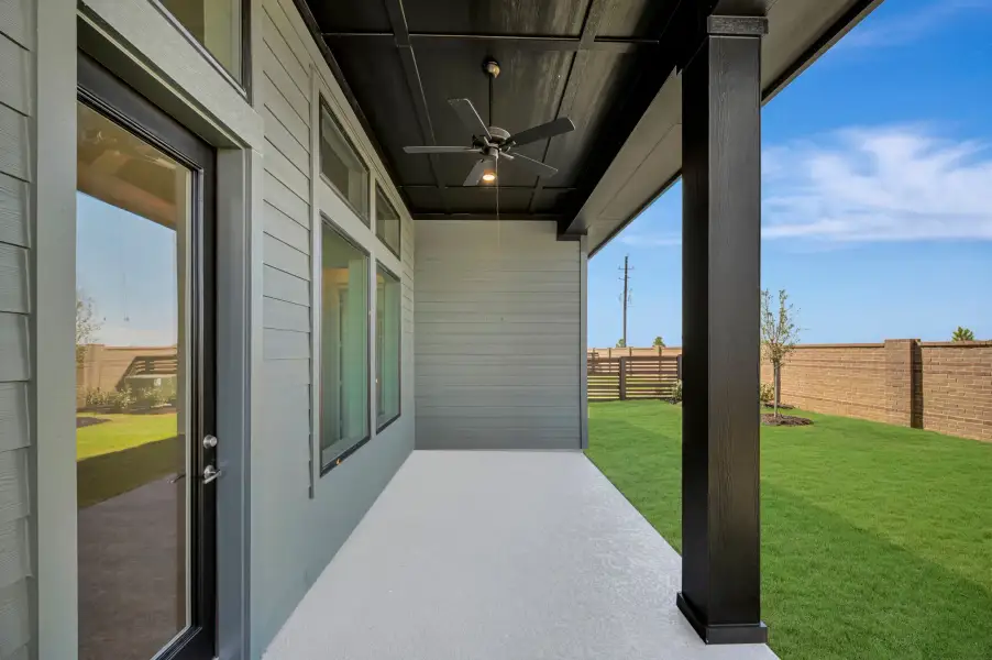 Exterior details and patio area of a home in Bridgeland Central: Emerald Heights - Enclave Collection, Cypress (Image 4).