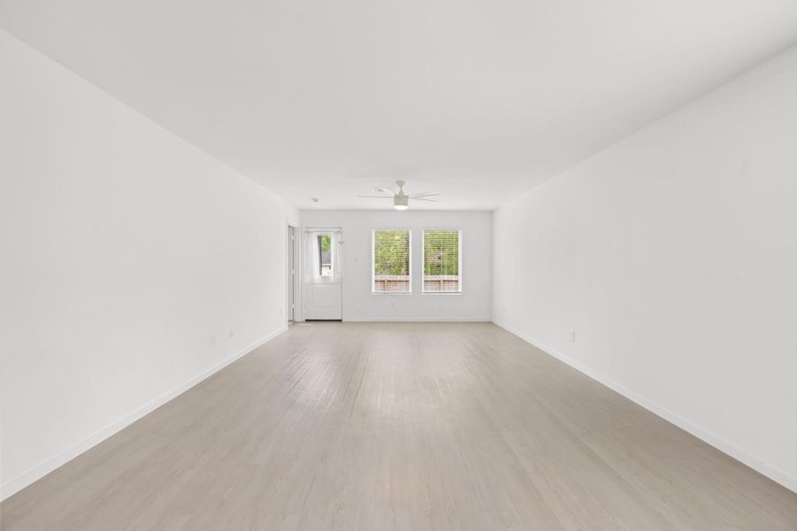A centered view highlights the generous proportions of the living room, offering plenty of flexibility for seating, media, and entertaining arrangements. A centered view highlights the generous proportions of the living room, offering plenty of flexibility for seating, media, and entertaining arrangements.