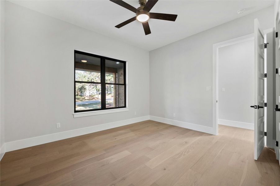 Spare room with ceiling fan and light hardwood / wood-style flooring