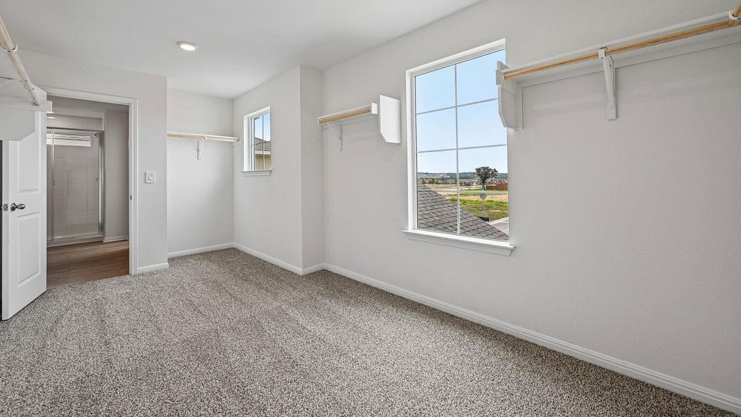 Spacious, unfurnished interior of a new home in Bar W Ranch, Leander (Image 29).