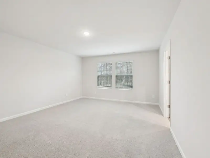 Spacious, unfurnished interior of a new home in Country Lane - Signature Series, Clayton (Image 15).