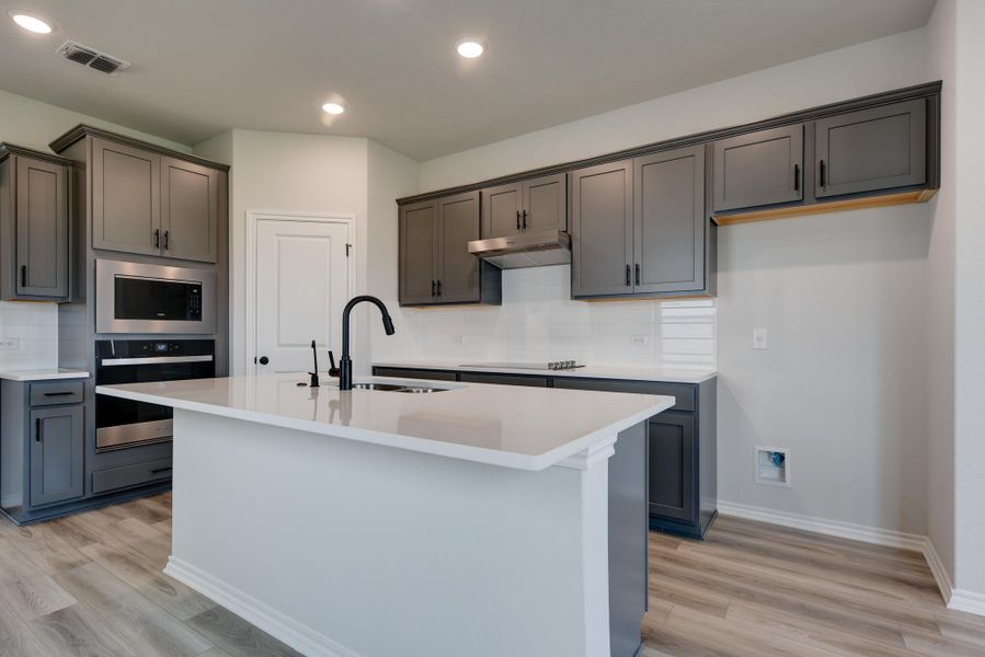 Representative furnished interior of a home built from the Travis by Ashton Woods in Meadows at Hennersby Hollow 40's, San Antonio (Image 4).