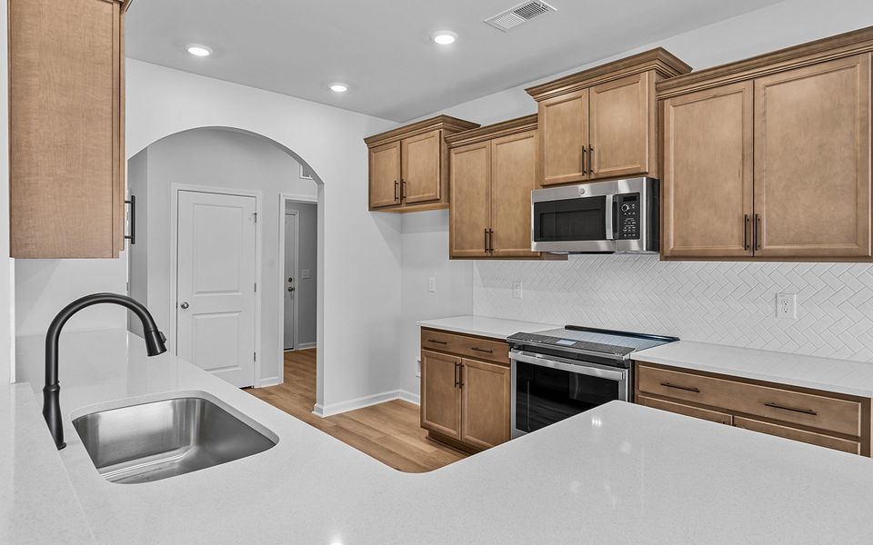 Furnished interior view inside a new home in Fieldstone, Lexington (Image 8).