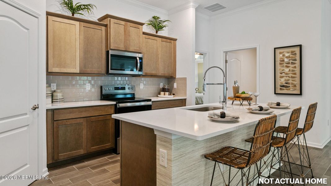 Furnished interior view inside a new home in Sawmill Branch, Palm Coast (Image 8).