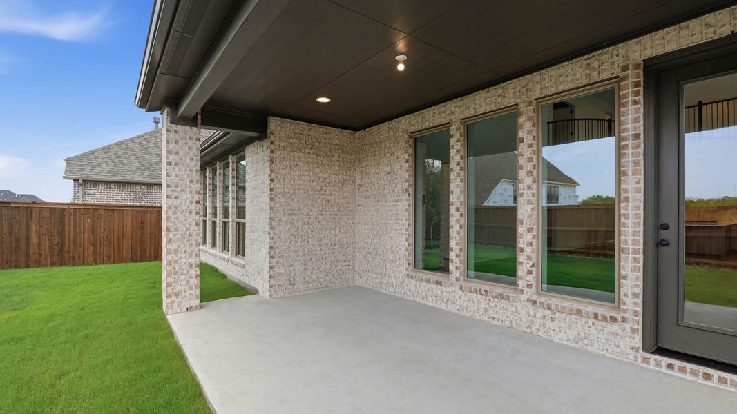 Exterior details and patio area of a home in Mustang Lakes, Celina (Image 3).