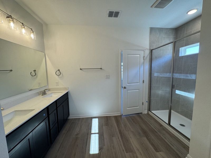 Furnished interior view inside a new home in Village at Three Oaks, Seguin (Image 9).
