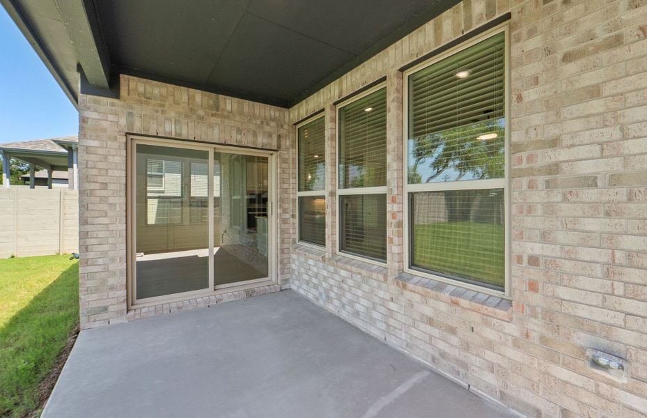 Exterior details and patio area of a home in Wolf Ranch, Georgetown (Image 29).