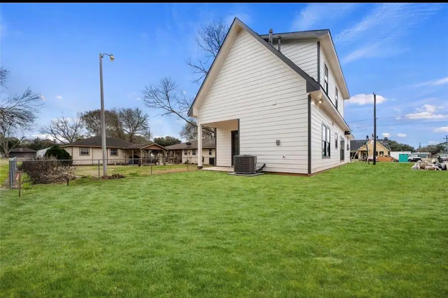 Exterior details and patio area of a home in , Beasley (Image 3).