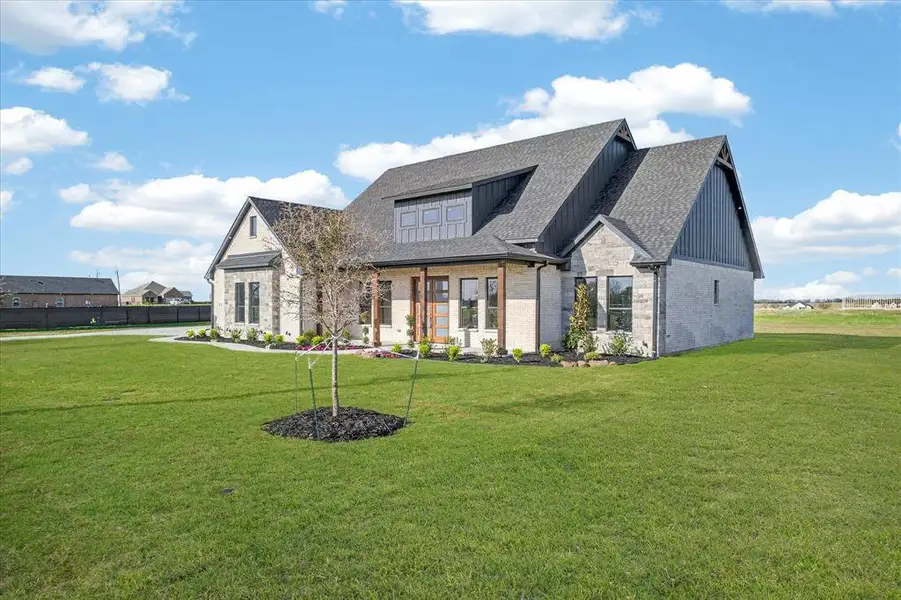 Front exterior of a new home in , Celeste, TX, highlighting curb appeal (Image 28).