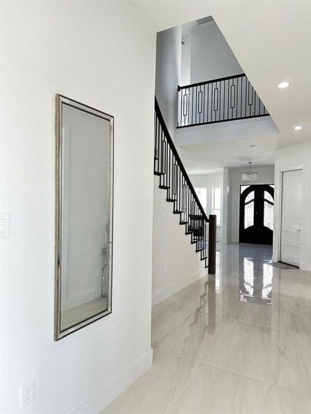 Dining area featuring french doors and light tile patterned flooring