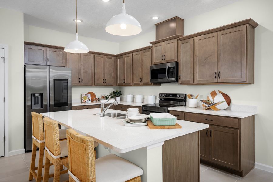 Representative furnished interior of a home built from the Dune by Risewell Homes in Hodges Reserve, Howey-in-the-Hills (Image 12).