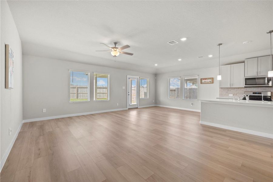 Spacious, unfurnished interior of a new home in Wall Street Village, Richmond (Image 29).